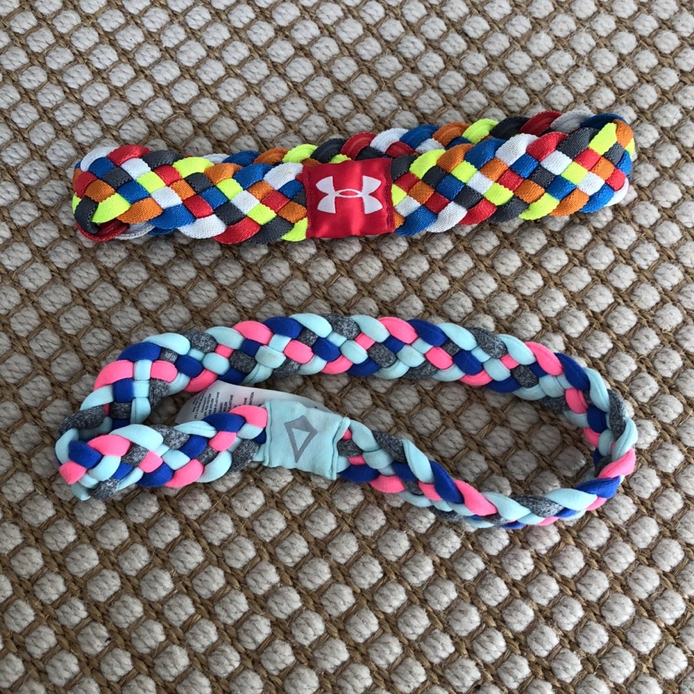 2 headbands, one Ivivva and one Under Armour